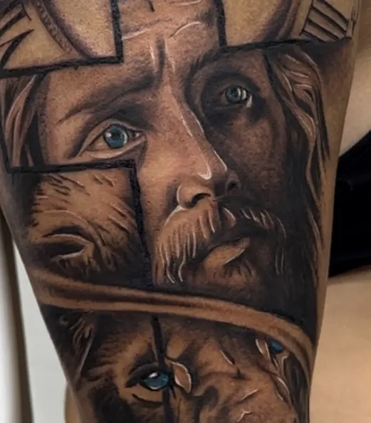 Black and grey religious portrait tattoo