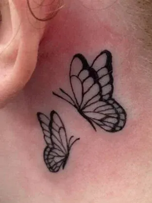 Two fine-line butterfly tattoos